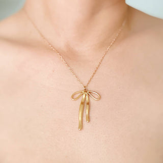 Stylist Bow Pendant Necklace-Necklaces-Ellison+Young-Summit Lane Boutique, Women's Apparel and Gifts located in Grand Rapids, MI
