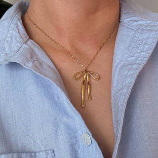 Stylist Bow Pendant Necklace-Necklaces-Ellison+Young-Summit Lane Boutique, Women's Apparel and Gifts located in Grand Rapids, MI