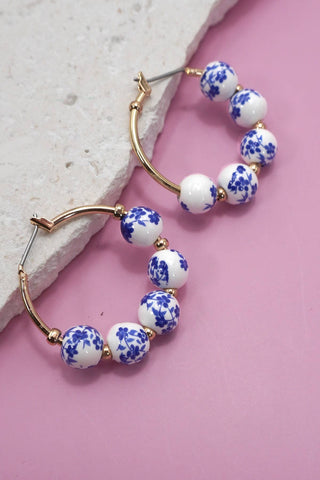 BLUE CERAMIC PORCELAIN HOOP EARRINGS | 80E6515-JOSSLYN by Wall to Wall-Summit Lane Boutique, Women's Apparel and Gifts located in Grand Rapids, MI