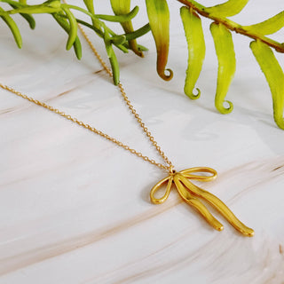 Stylist Bow Pendant Necklace-Necklaces-Ellison+Young-Summit Lane Boutique, Women's Apparel and Gifts located in Grand Rapids, MI