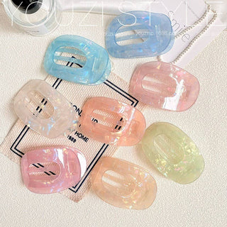 Irredscent Lay Flat Oval Claw Clip-Hair Accessories-JOSSLYN by wall to wall-Summit Lane Boutique, Women's Apparel and Gifts located in Grand Rapids, MI